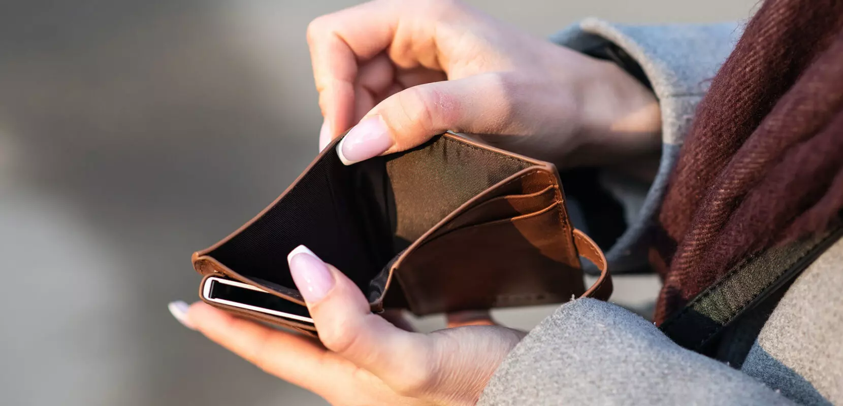 empty wallet displaying lack of wealth