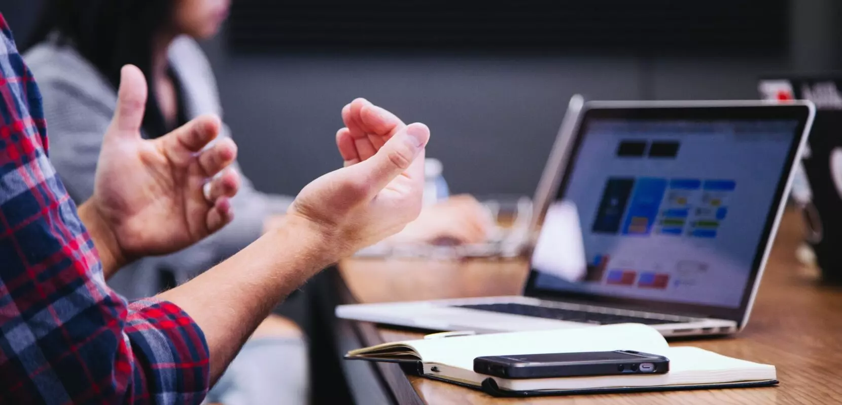 a group of coworkers have a meeting to discuss year-end communication