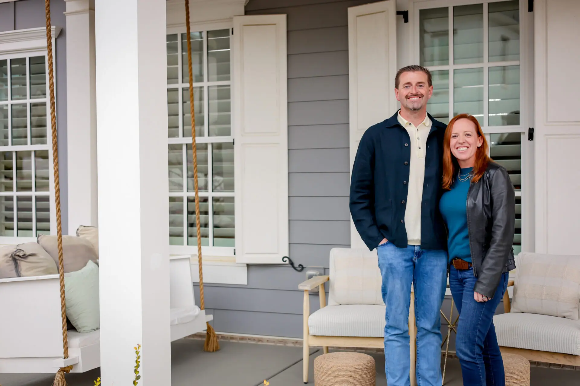 Donors of The Signatry standing on a patio smiling.